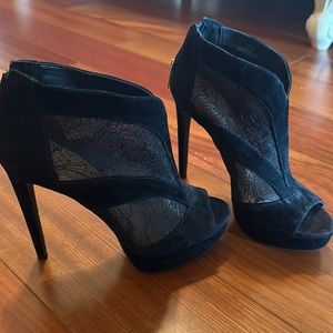 Black open toe stiletto with sheer front/zipper back